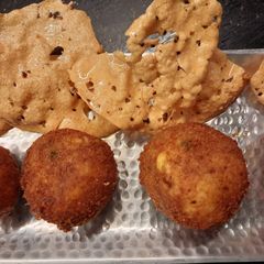 A picture of Dal and Rice Balls.
