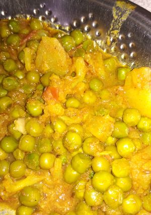 A picture of Green matar potato ki sabji.