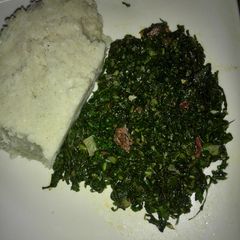 A picture of Fried kales served with Ugali.