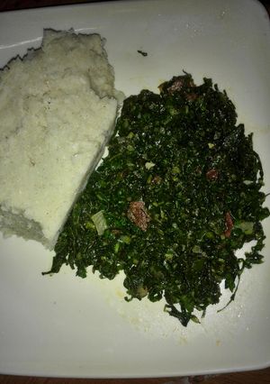 A picture of Fried kales served with Ugali.