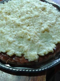 Una foto de Tarta de dulce de leche y crema