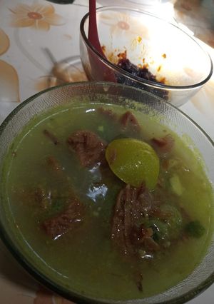 A picture of Soto Daging (Beef Soup with coconut milk and turmeric).