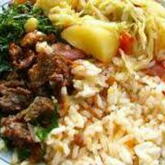 A picture of Boiled Rice with Fried Beef and Vegetables.