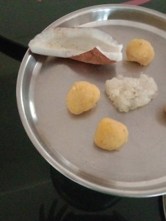 A picture of Mango coconut laddu.