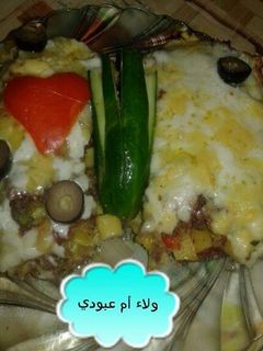 صورة لوصفة بيتزا المكرونه بالاجبان