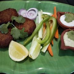 A picture of Seer fish cutlet with mint mayo and garlicky yoghurt dip.