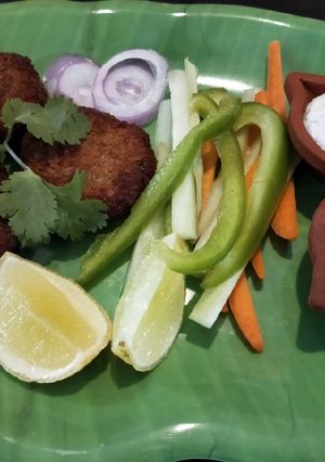 A picture of Seer fish cutlet with mint mayo and garlicky yoghurt dip.