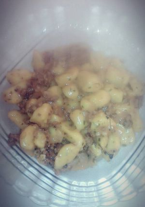 Una foto de Ñoquis de Zapallo con salsa