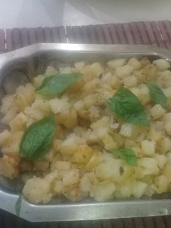 Una foto de Papas condimentadas al horno