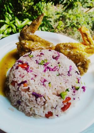 Una foto de ALITAS A LA NARANJA, y arroz con vegetales