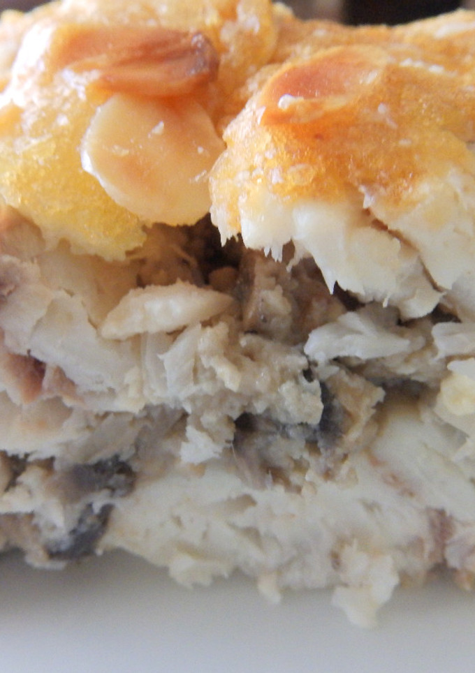 Una foto de Merluza rellena y alioli gratinado