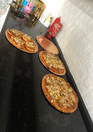 صورة لوصفة بيتزا حجم كبير وزاكيه 💕