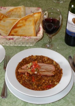 A picture of Pork Ribs with Lentils.