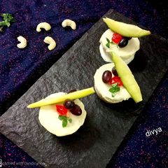 A picture of Vegan raw mango cheese cup cakes.