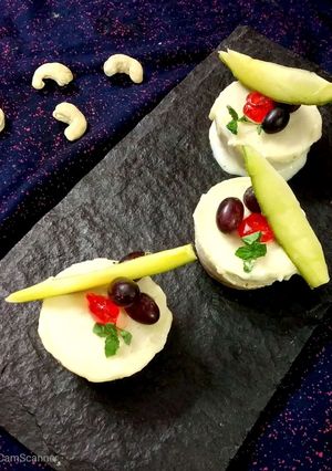A picture of Vegan raw mango cheese cup cakes.