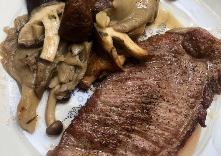 Presa ibérica con salteado de setas