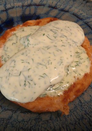 A picture of Pan-Fried Salmon with Creamy Dill Sauce.