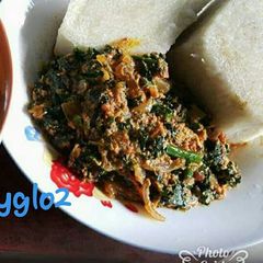 Boiled yam with vegetable egg sauce A picture of Boiled yam with vegetable egg sauce.