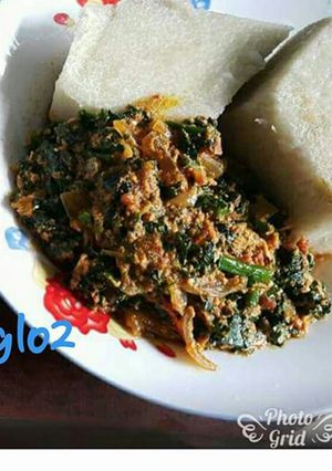 A picture of Boiled yam with vegetable egg sauce.