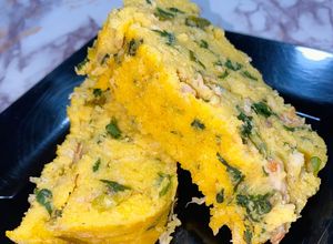 Una foto de Polenta de pollo y espinaca