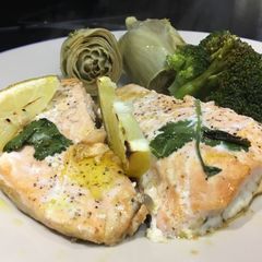 A picture of Salmon roast in butter, lemon and coriander.