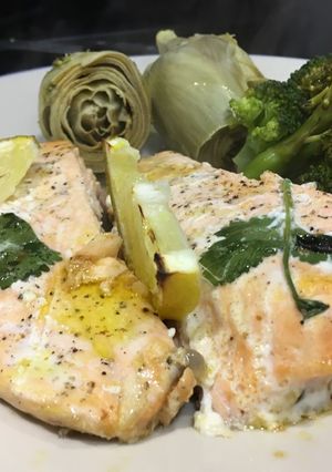 A picture of Salmon roast in butter, lemon and coriander.