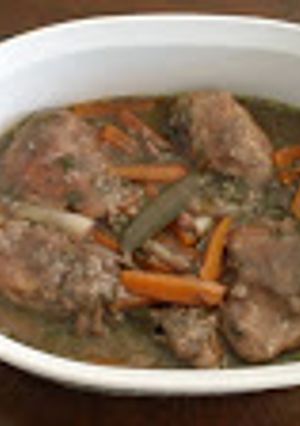 Una foto de Coq au vin