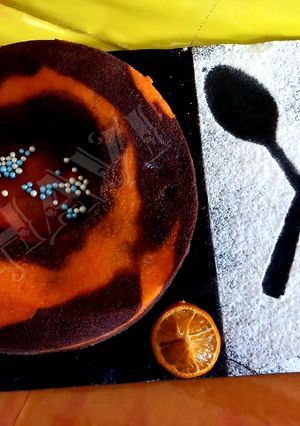 A picture of Eggless orange and chocolate cake.