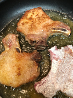 A picture of Pan fried pork chops.