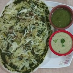 A picture of Palak-Potato Cheesy Dosa.