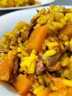 Una foto de Arroz meloso de pato y calabaza
