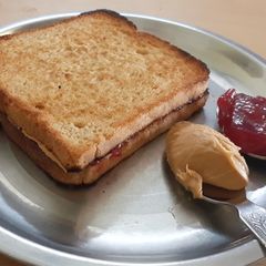 A picture of Peanut butter jam sandwich.