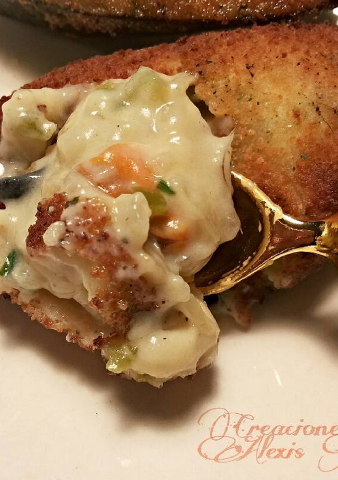 Una foto de Mejillones rellenos de mejillones con bechamel