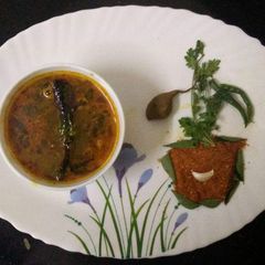 A picture of Raw tamrind rasam.
