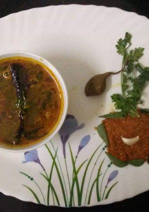 A picture of Raw tamrind rasam.