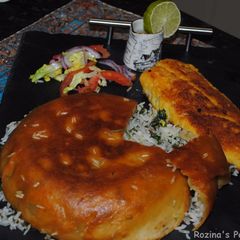 A picture of Persian herbed rice with fish (Sabzi polow mahi) for Iranian new year (Nowruz).