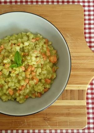 A picture of Barley Risotto with Smoked Salmon and Zucchini.