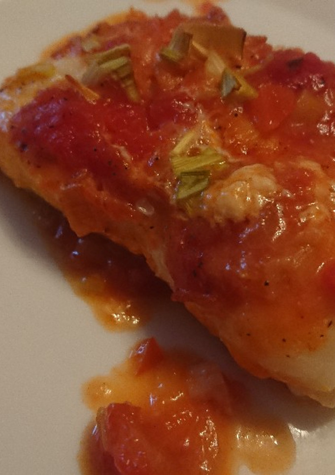 Una foto de Bacalao con tomate