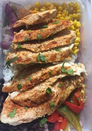 A picture of Lunchtime Chicken Fajita Bowls w/ Mexican white sauce.