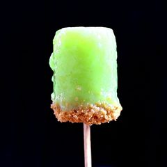 A picture of Raw Mango Mint Cheese cake popsicle.