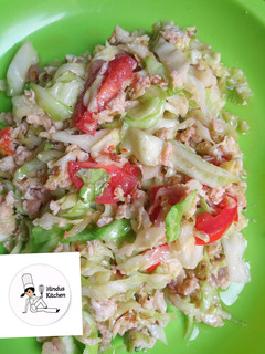A picture of Steamed cabbage with egg.