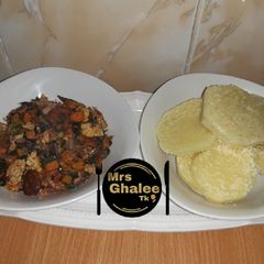A picture of Boiled yam with steamed veggies moringa plantain egg n fish sauc.