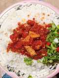 Rice and stew with salad