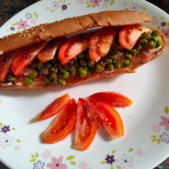 A picture of Footlong bread loaded with vegetables.