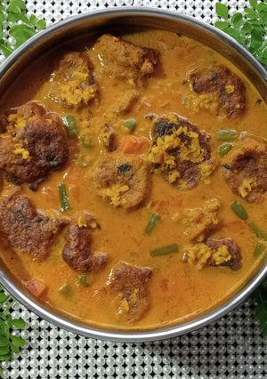 A picture of Drumstick Urad Dal Vada Curry.