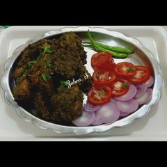 Ghee Roast Chicken in Green Masala A picture of Ghee Roast Chicken in Green Masala.