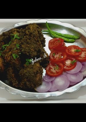 A picture of Ghee Roast Chicken in Green Masala.
