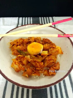 Una foto de Repollo con atún arroz y yema de huevo(col)