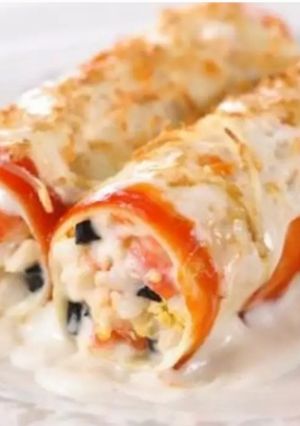 Una foto de Canelones marisco y pescado