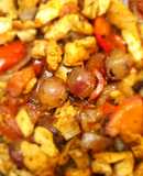 Pollo salteado con uvas